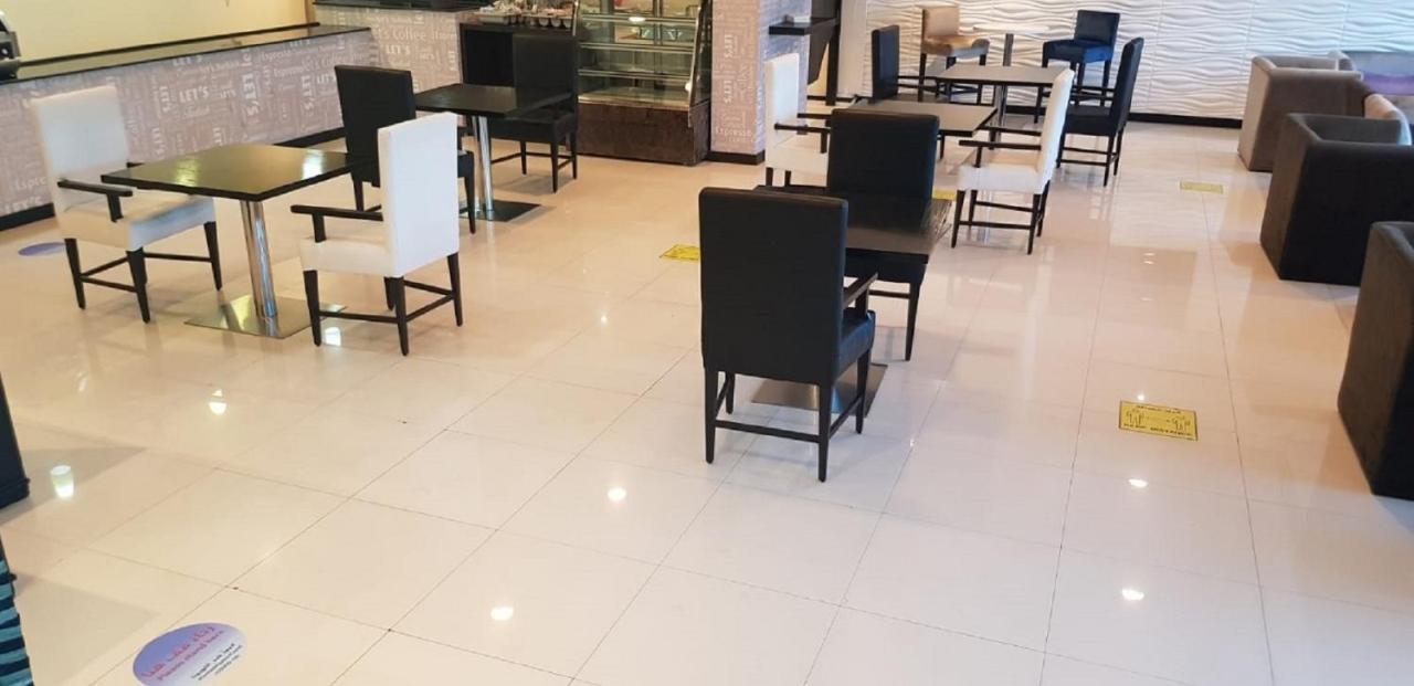 מנאמה Tulip Hotel & Suites מראה חיצוני תמונה